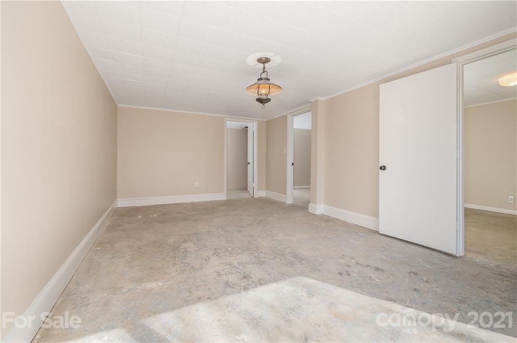 285 Tanner Street Rutherfordton, NC 28139 - Photo 29 of 39 wooden floor in an empty room