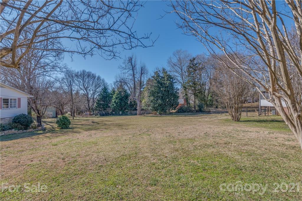 285 Tanner Street Rutherfordton, NC 28139 - Photo 37 of 39 a view of a yard with a trees