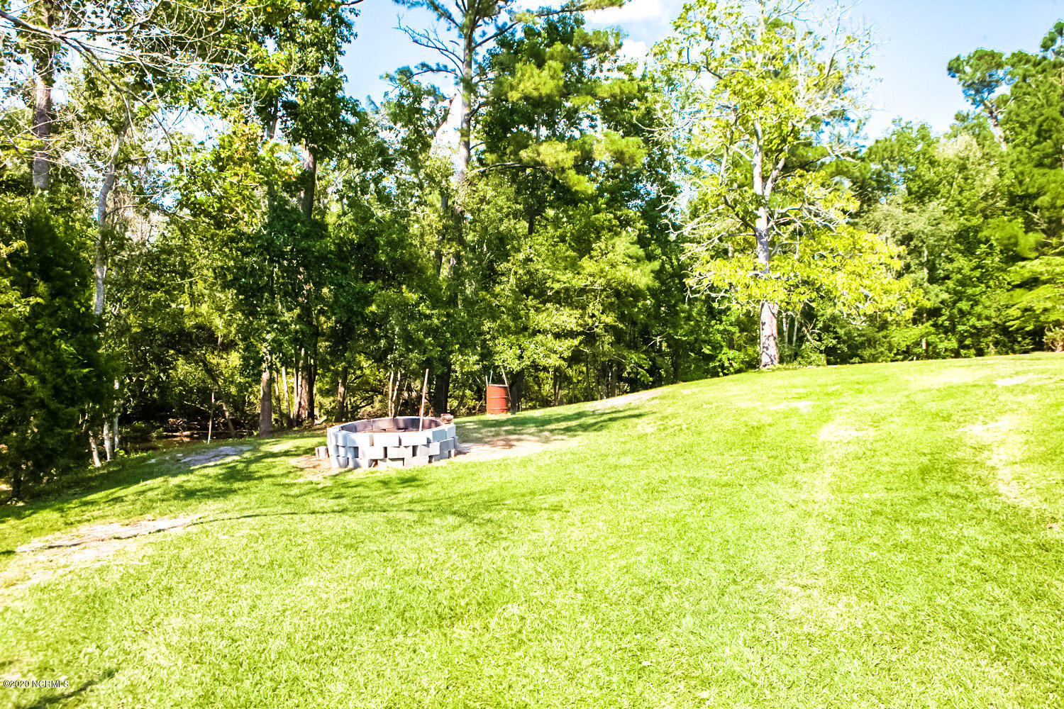 114 Loop Road Leland, NC 28451 - Photo 6 of 21 Side Yard Next to Pond