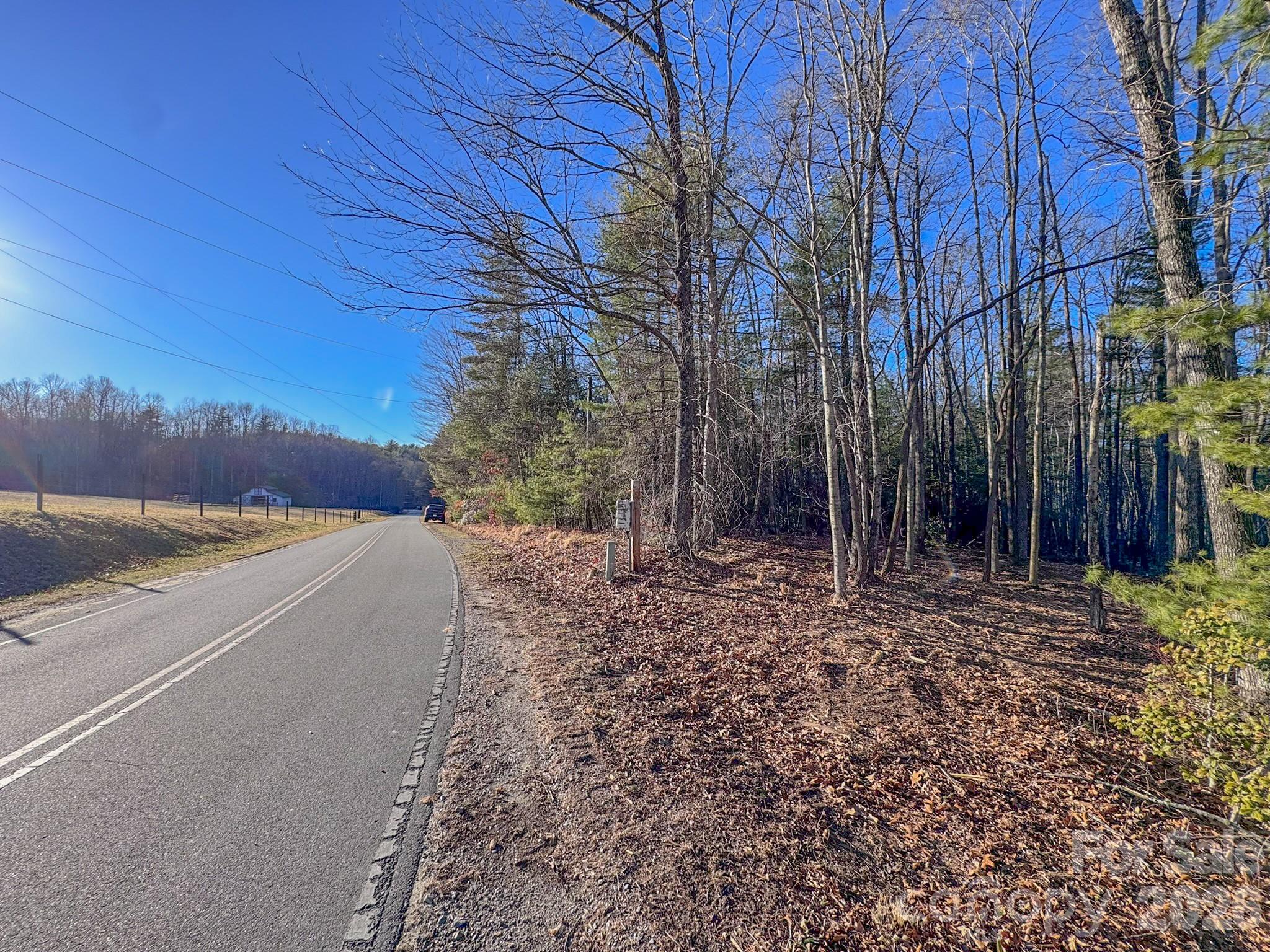 0 Old CCC Road, Unit 3 Hendersonville, NC 28739 - Photo 13 of 43 a view of a yard with wooden fence