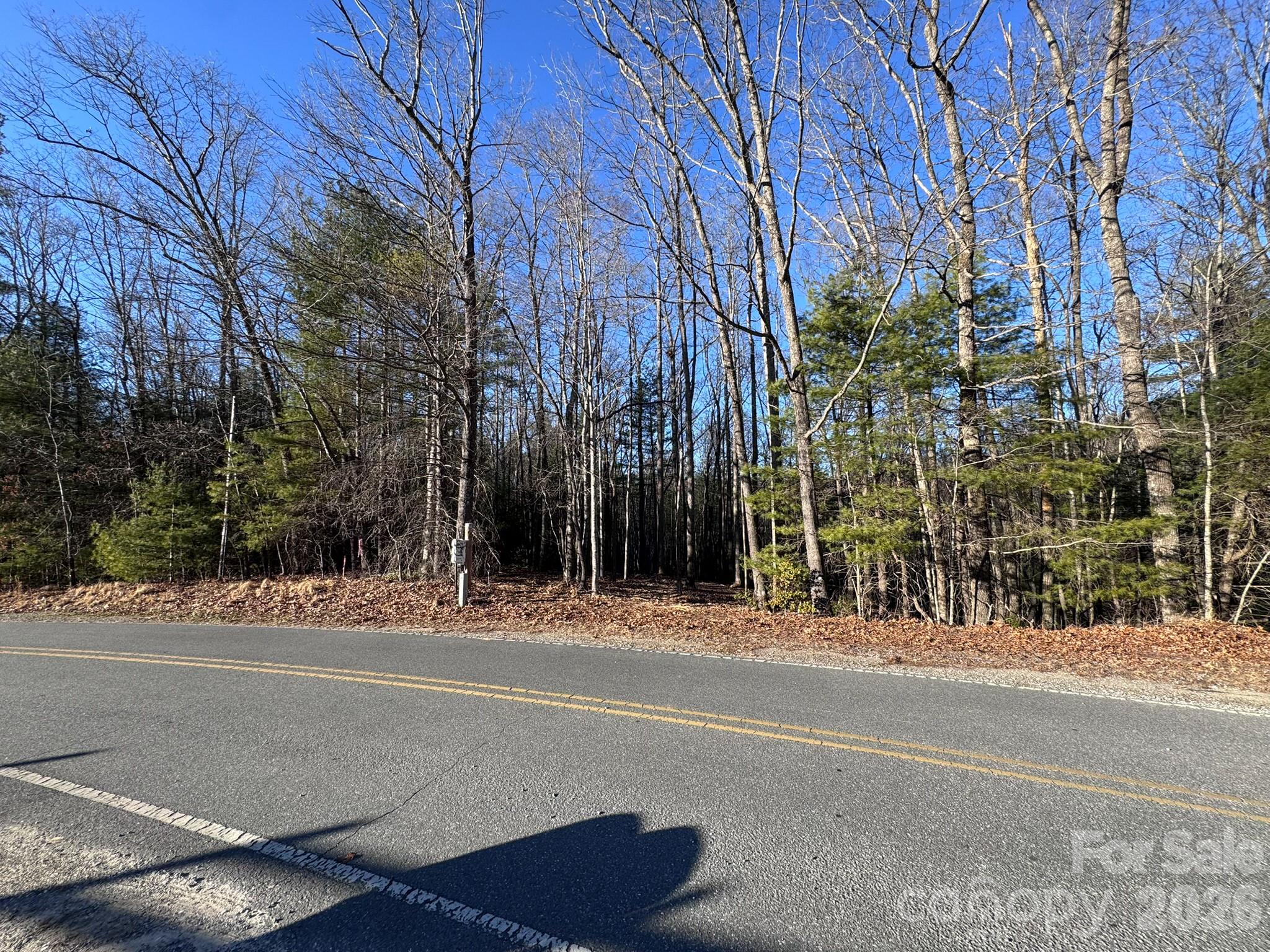 0 Old CCC Road, Unit 3 Hendersonville, NC 28739 - Photo 9 of 43 a view of a building with a street