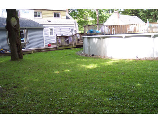 939 Bradley Road Springfield, MA 01109 - Photo 8 of 9 a front view of a house with garden