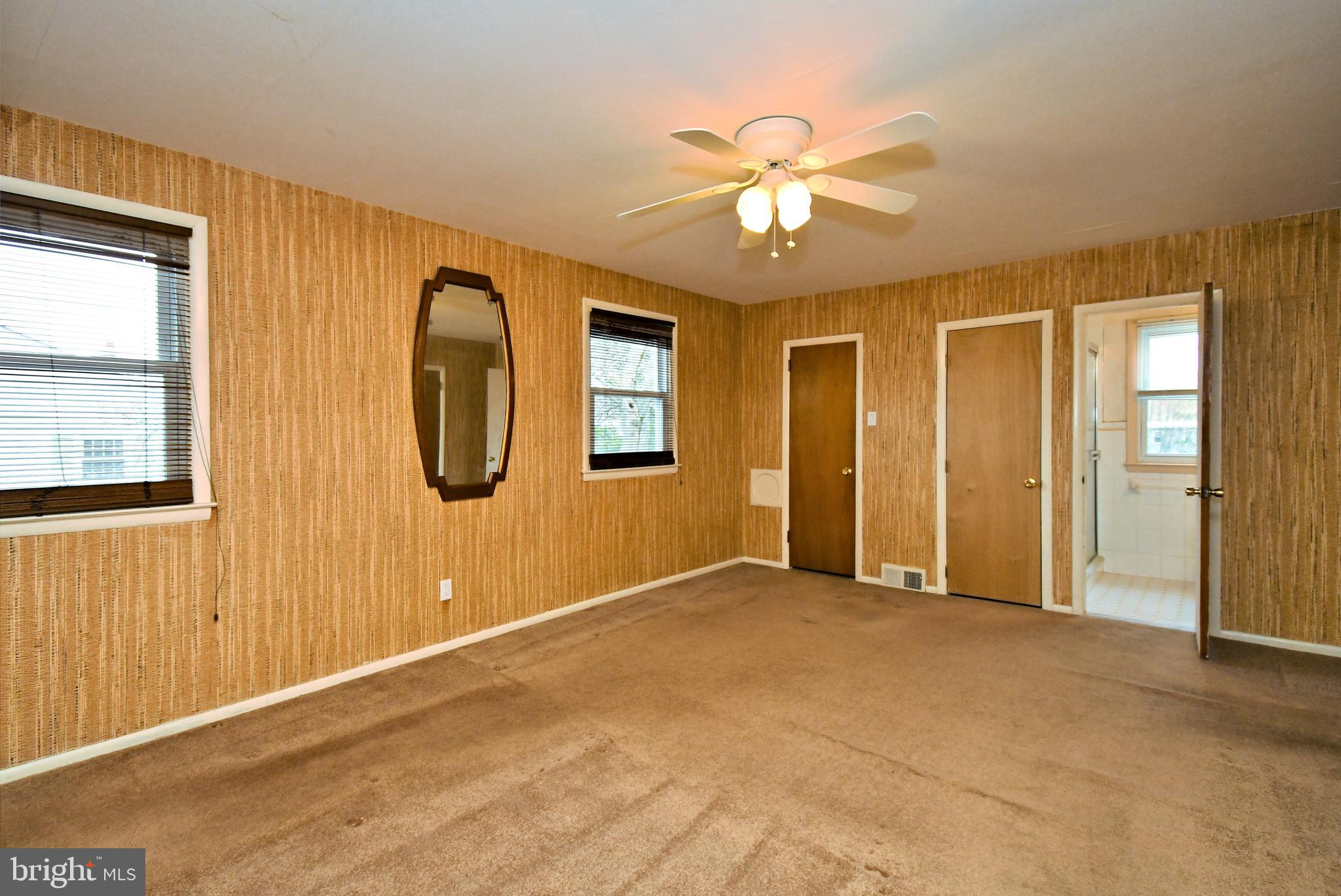 1658 Cavan Drive Dresher, PA 19025 - Photo 14 of 25 an empty room with windows and fan