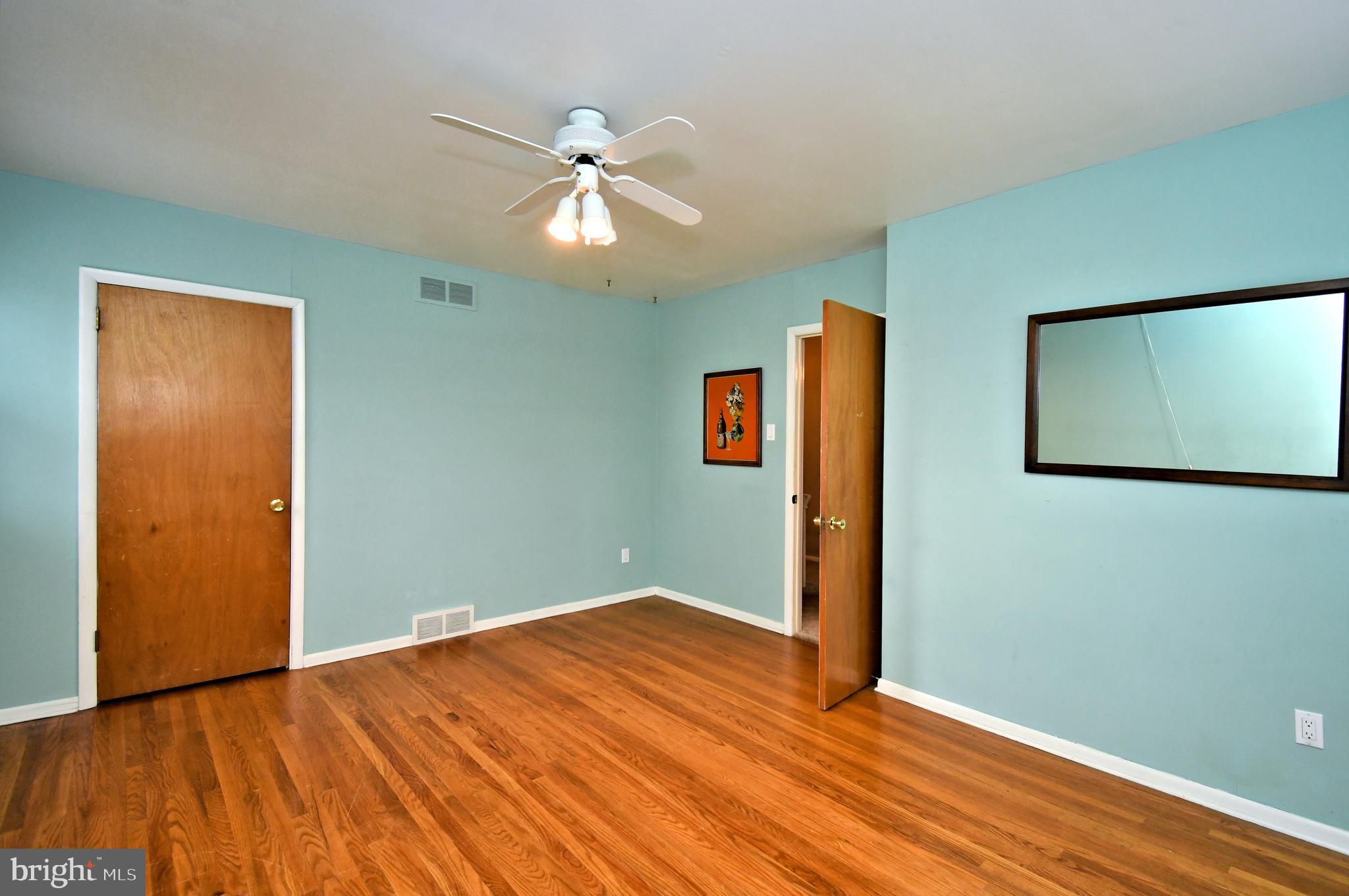 1658 Cavan Drive Dresher, PA 19025 - Photo 18 of 25 a view of empty room with wooden floor