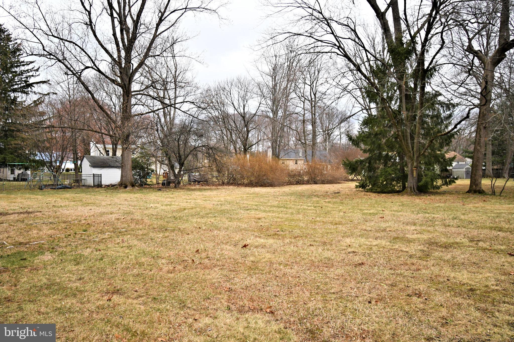1658 Cavan Drive Dresher, PA 19025 - Photo 24 of 25 a view of yard covered with snow in front of house