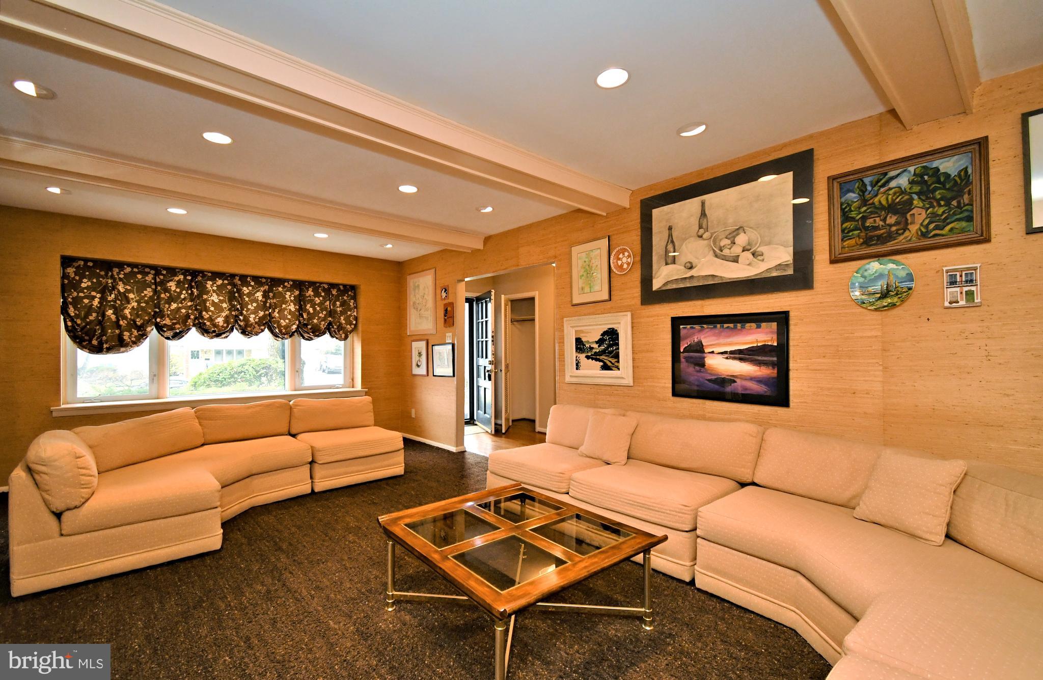 1658 Cavan Drive Dresher, PA 19025 - Photo 4 of 25 a living room with furniture and a large window