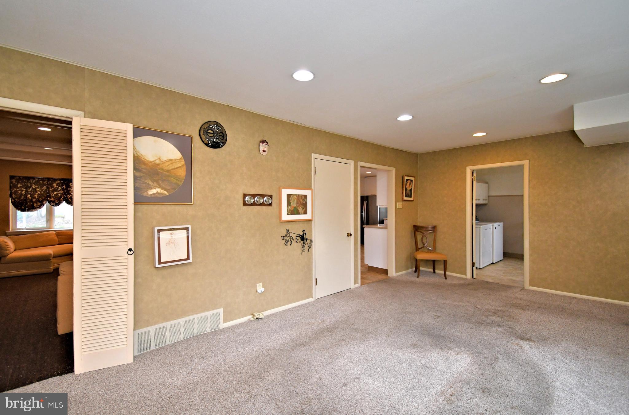 1658 Cavan Drive Dresher, PA 19025 - Photo 10 of 25 a view of a livingroom with wooden floor and windows