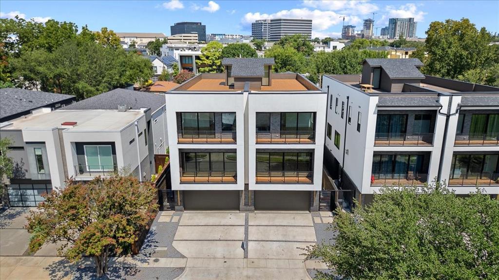 4517 Weldon Street Dallas, TX 75204 - Photo 3 of 40 a front view of a building with a garden