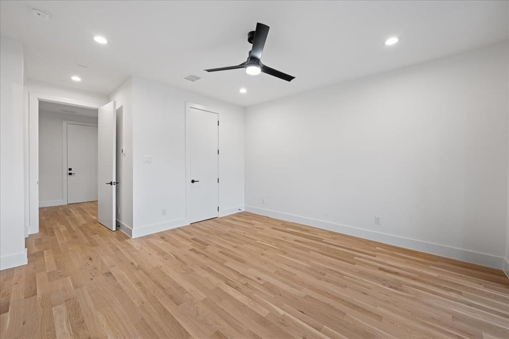4517 Weldon Street Dallas, TX 75204 - Photo 6 of 40 a view of empty room with wooden floor