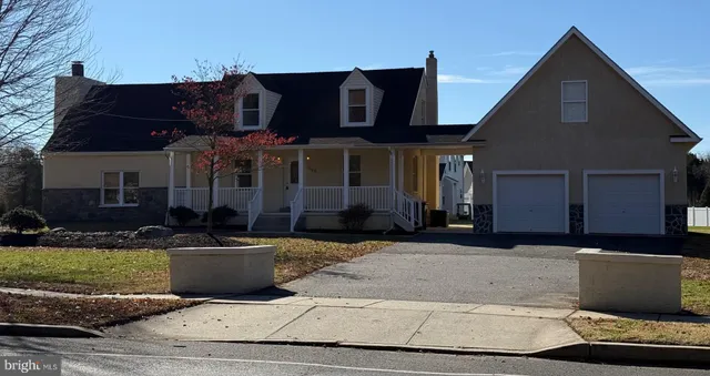 a front view of a house with entertaining space