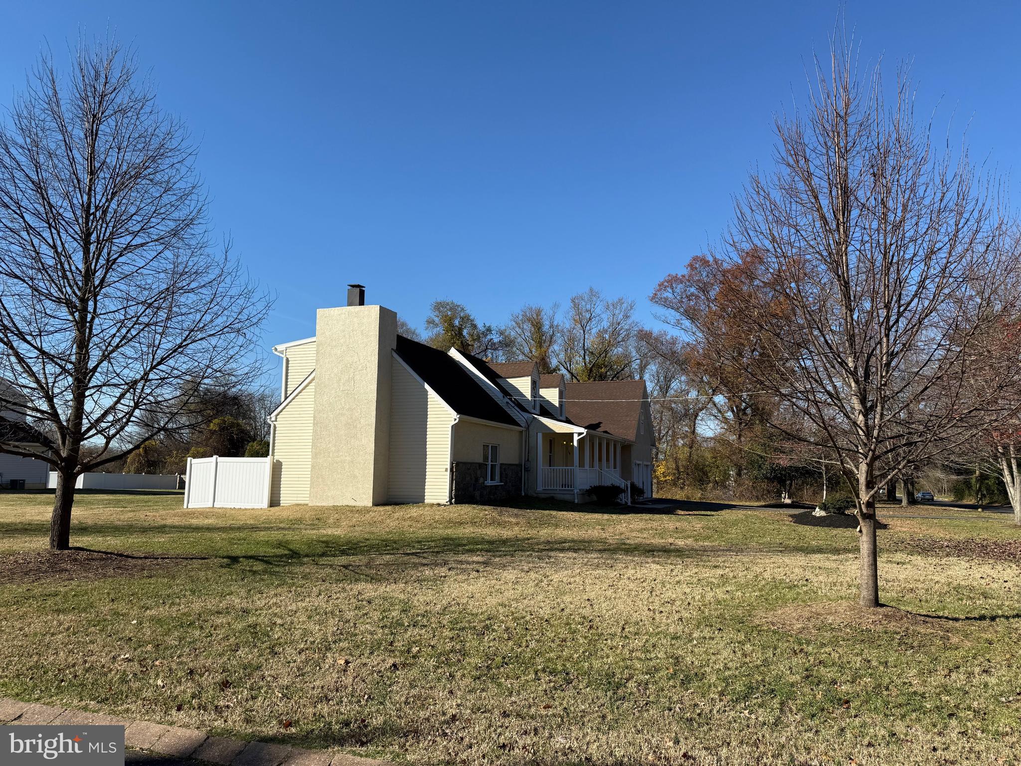 1100 Chews Landing Road Laurel Springs, NJ 08021 - Photo 26 of 33 a front view of a house with a yard