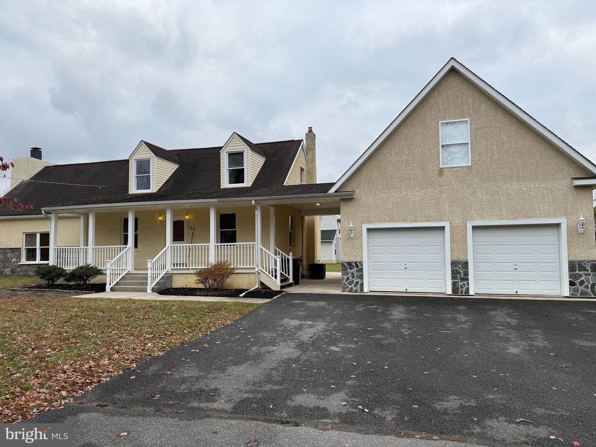 1100 Chews Landing Road Laurel Springs, NJ 08021 - Photo 3 of 33 a front view of a house with a yard