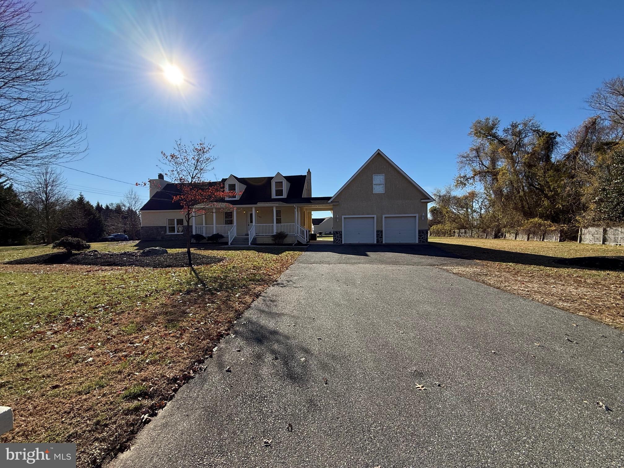1100 Chews Landing Road Laurel Springs, NJ 08021 - Photo 6 of 33 a front view of a house with a yard