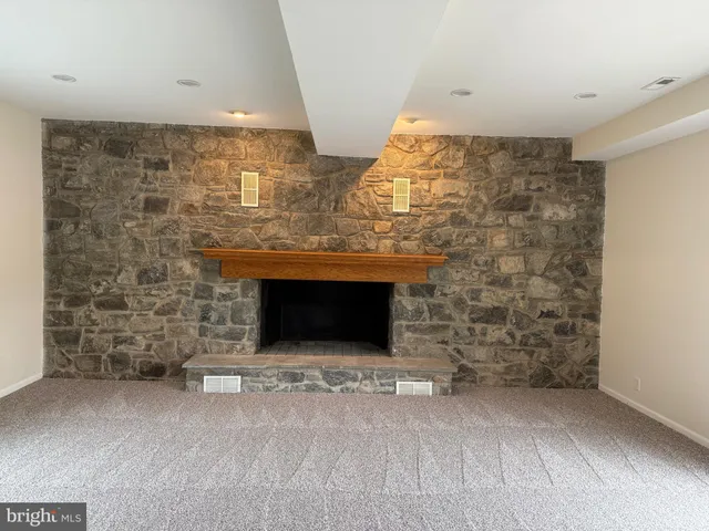 a room with a fireplace