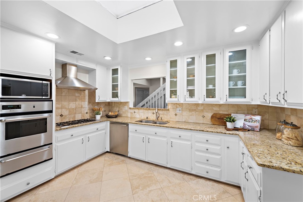 3044 Cresta Way Laguna Beach, CA 92651 - Photo 12 of 48 a kitchen with granite countertop a sink stainless steel appliances and cabinets
