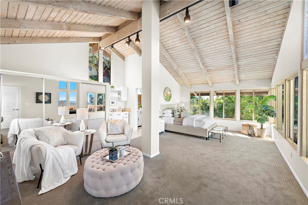3044 Cresta Way Laguna Beach, CA 92651 - Photo 19 of 48 a living room with furniture and a large window
