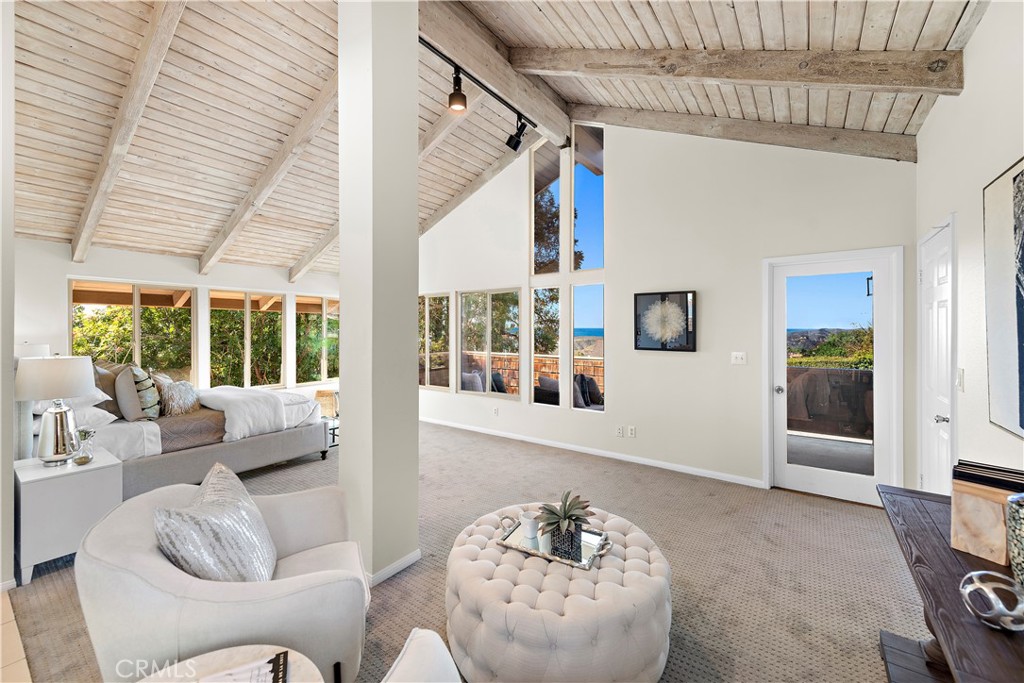 3044 Cresta Way Laguna Beach, CA 92651 - Photo 21 of 48 a living room with furniture and a large window