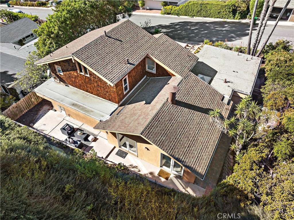 3044 Cresta Way Laguna Beach, CA 92651 - Photo 44 of 48 an aerial view of multiple houses with a yard
