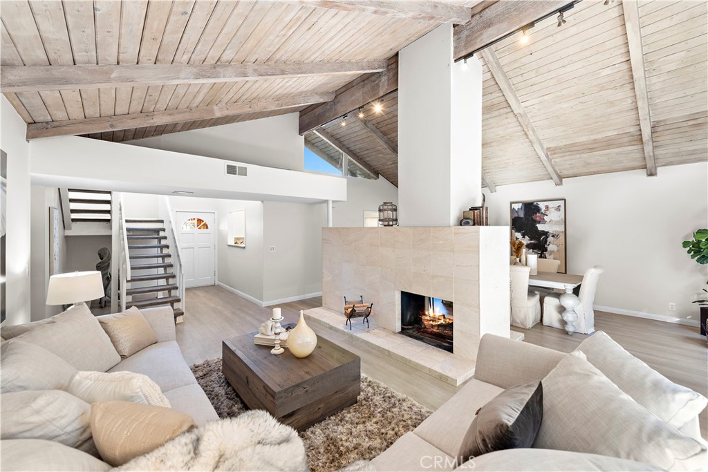 3044 Cresta Way Laguna Beach, CA 92651 - Photo 7 of 48 a living room with furniture and a fireplace