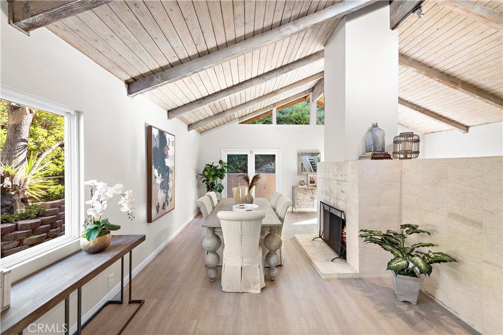 3044 Cresta Way Laguna Beach, CA 92651 - Photo 8 of 48 a living room with furniture fireplace and large windows