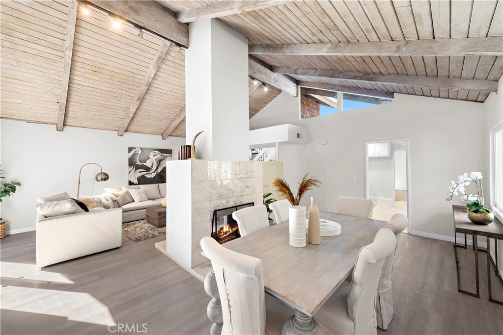 3044 Cresta Way Laguna Beach, CA 92651 - Photo 10 of 48 a living room with furniture and a table