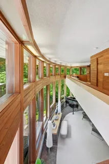 a room with blue lights with furniture