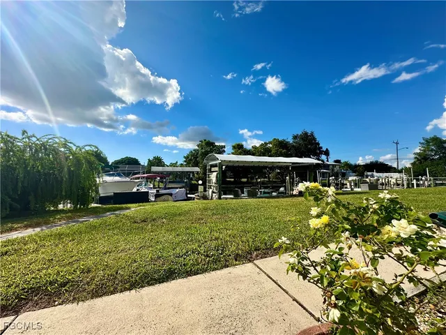 a view of a house with a back yard