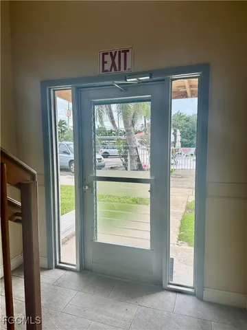 a view of a porch with wooden floor