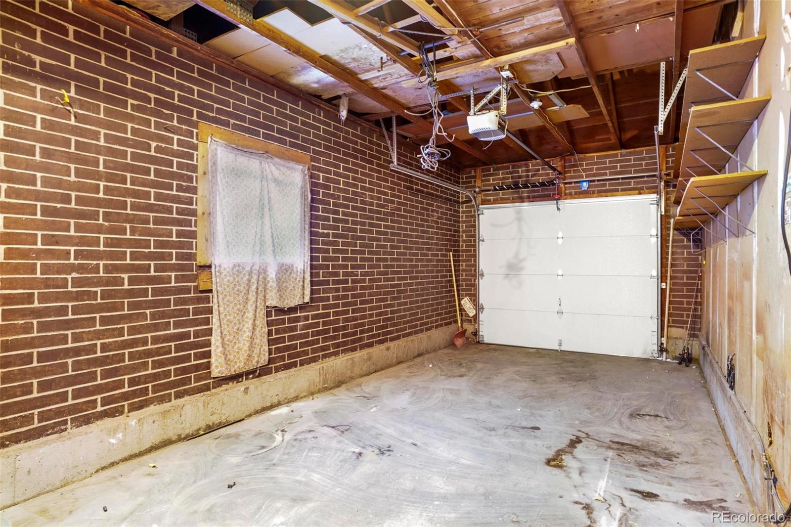 5522 Carson Street Denver, CO 80239 - Photo 31 of 40 a view of a garage