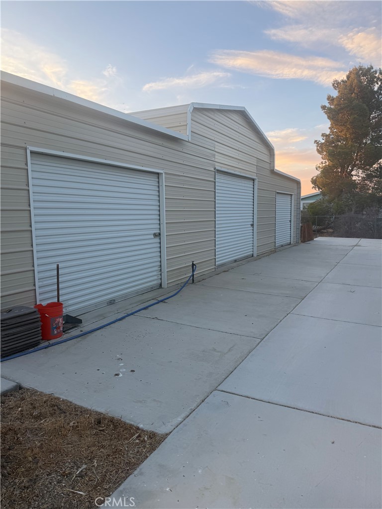 4778 Luna Road Phelan, CA 92371 - Photo 4 of 6 a view of backyard of house