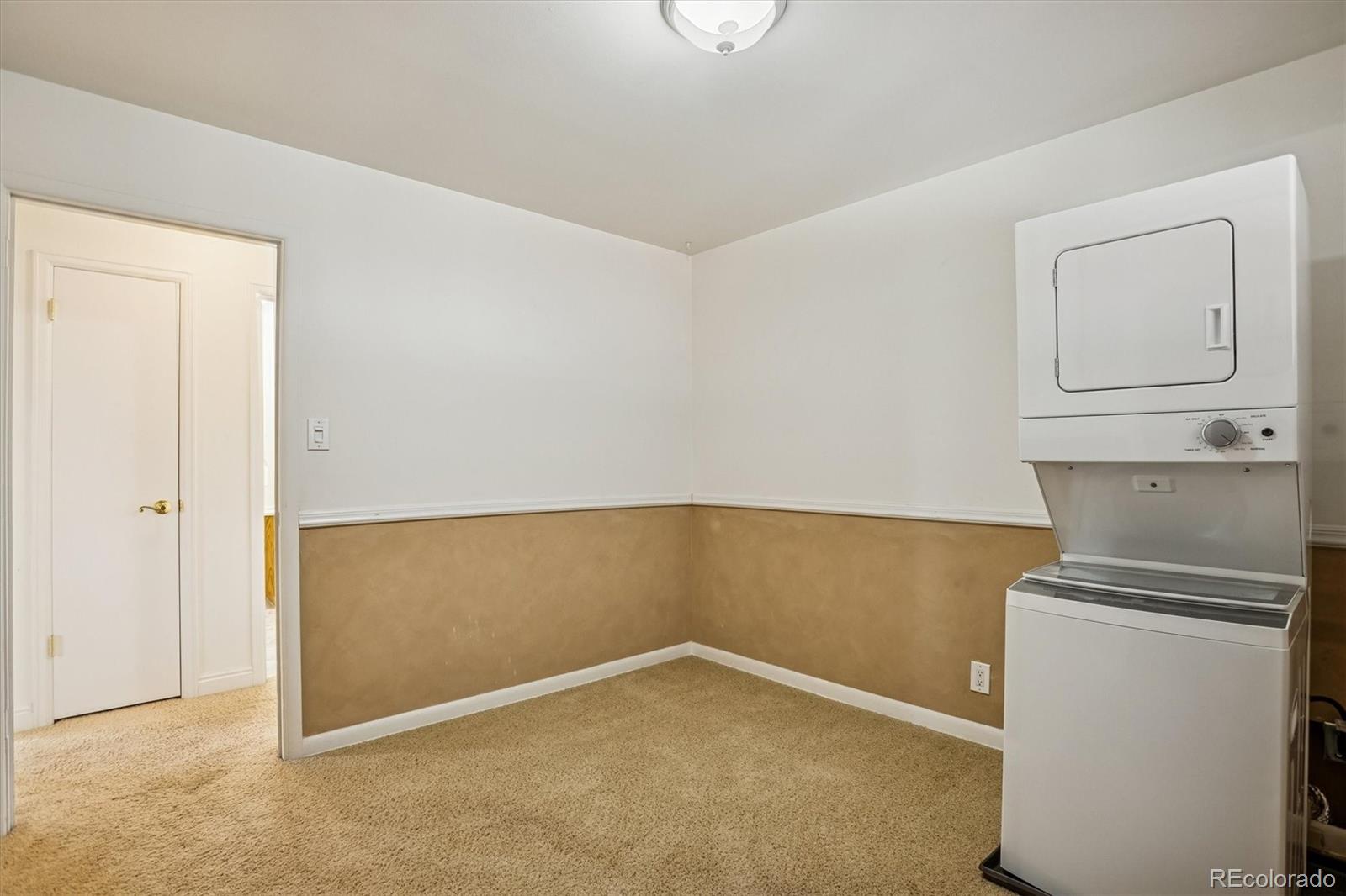 7798 Quivas Street Denver, CO 80221 - Photo 14 of 39 a view of an empty room
