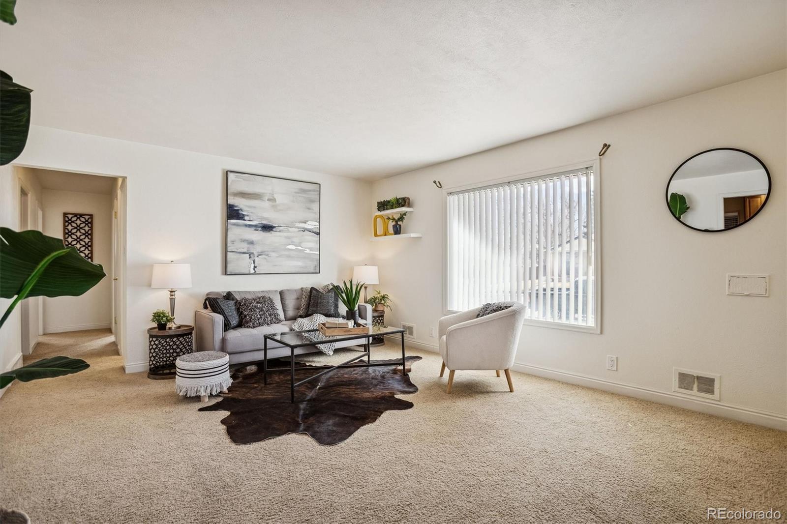 7798 Quivas Street Denver, CO 80221 - Photo 3 of 39 a living room with furniture