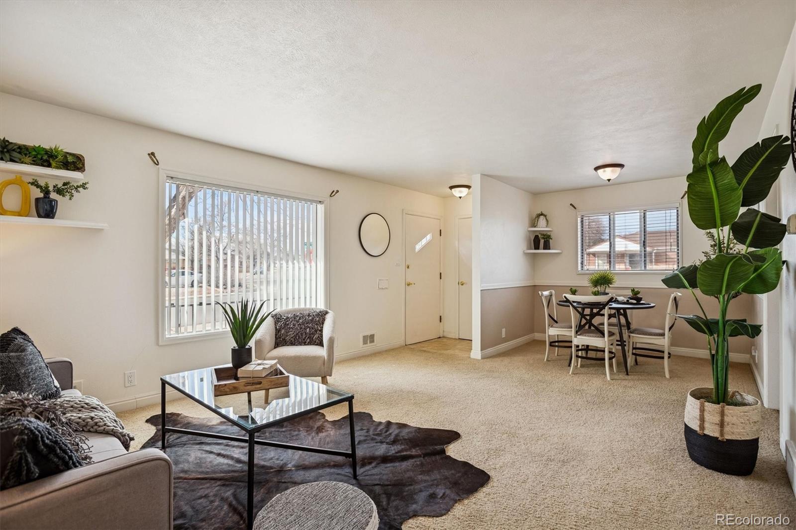 7798 Quivas Street Denver, CO 80221 - Photo 4 of 39 a living room with furniture