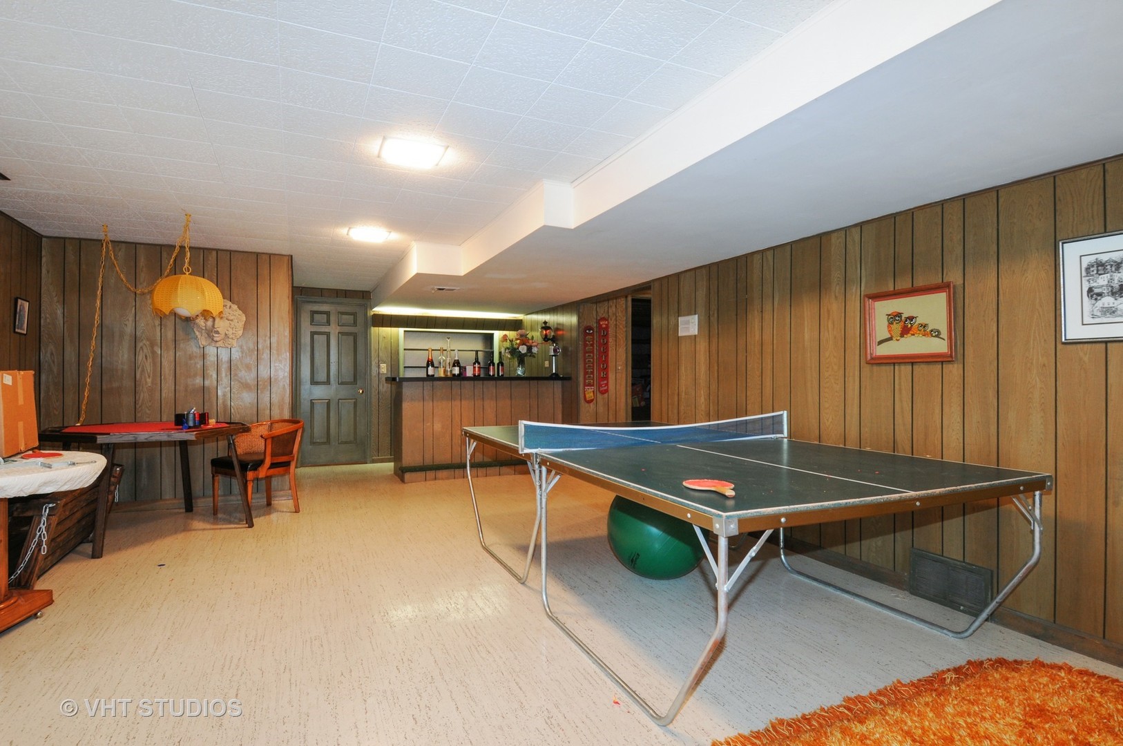 945 Anne Road Naperville, IL 60540 - Photo 8 of 10 a room with furniture and air hockey table