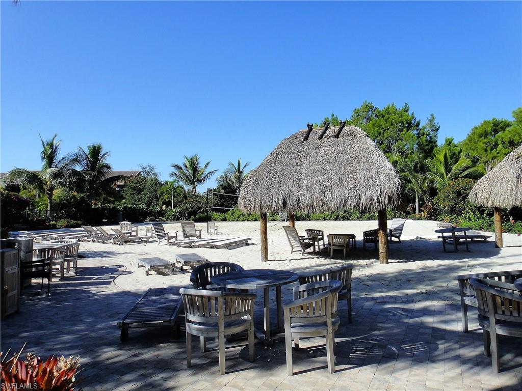 8975 Malibu Street, Unit 1302 Naples, FL 34113 - Photo 30 of 34 a view of an outdoor space with seating