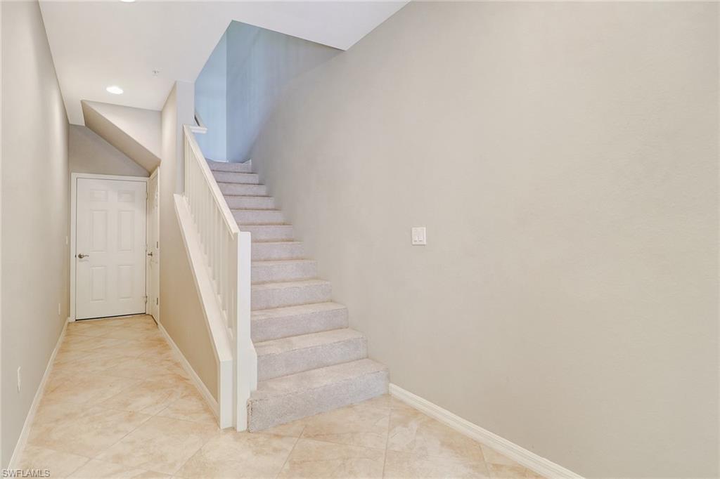 8975 Malibu Street, Unit 1302 Naples, FL 34113 - Photo 3 of 34 a view of entryway with stairs