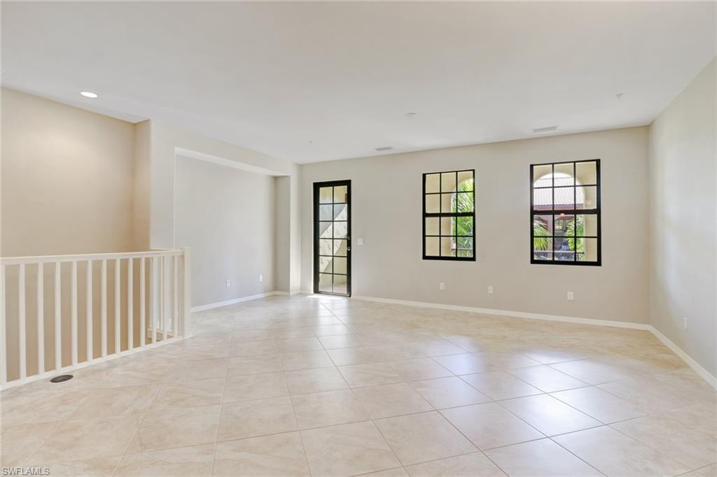 8975 Malibu Street, Unit 1302 Naples, FL 34113 - Photo 4 of 34 a view of an empty room with a window