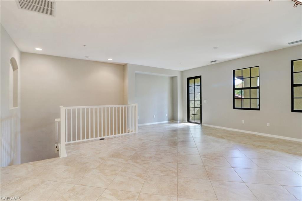 8975 Malibu Street, Unit 1302 Naples, FL 34113 - Photo 5 of 34 a view of an empty room with a window