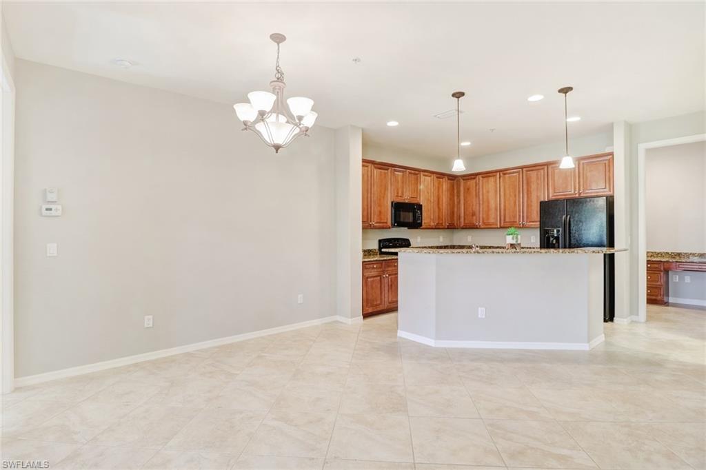 8975 Malibu Street, Unit 1302 Naples, FL 34113 - Photo 9 of 34 a view of a kitchen with a sink