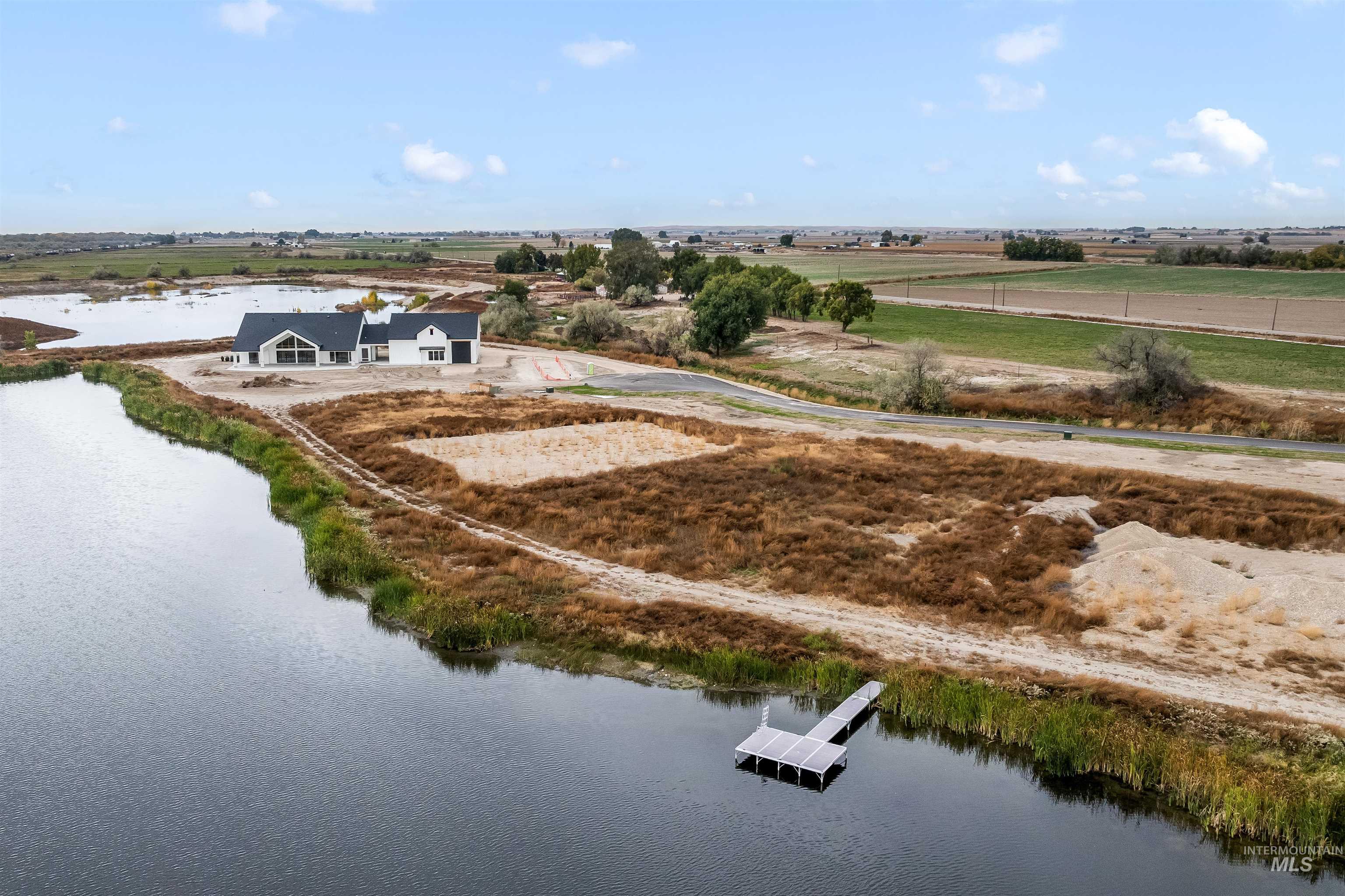 Tbd Tbd Lake Caldwell, ID 83607 - Photo 2 of 18 Aerial view of sparsely populated area featuring a nearby body of water