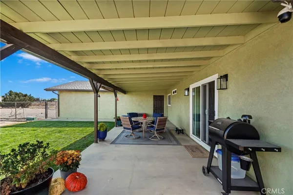 a view of outdoor space yard deck patio and fire pit