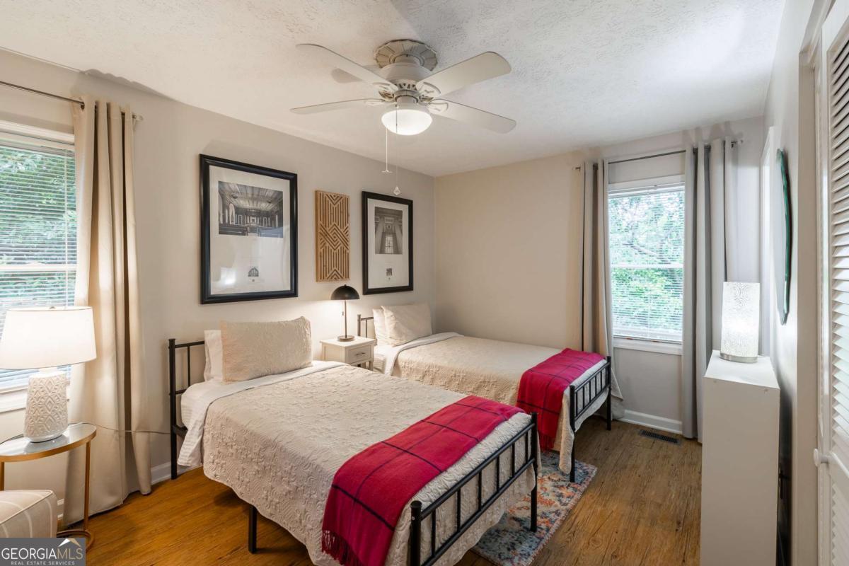 168 Pearl Street Athens, GA 30601 - Photo 21 of 43 a bedroom with two beds and a window