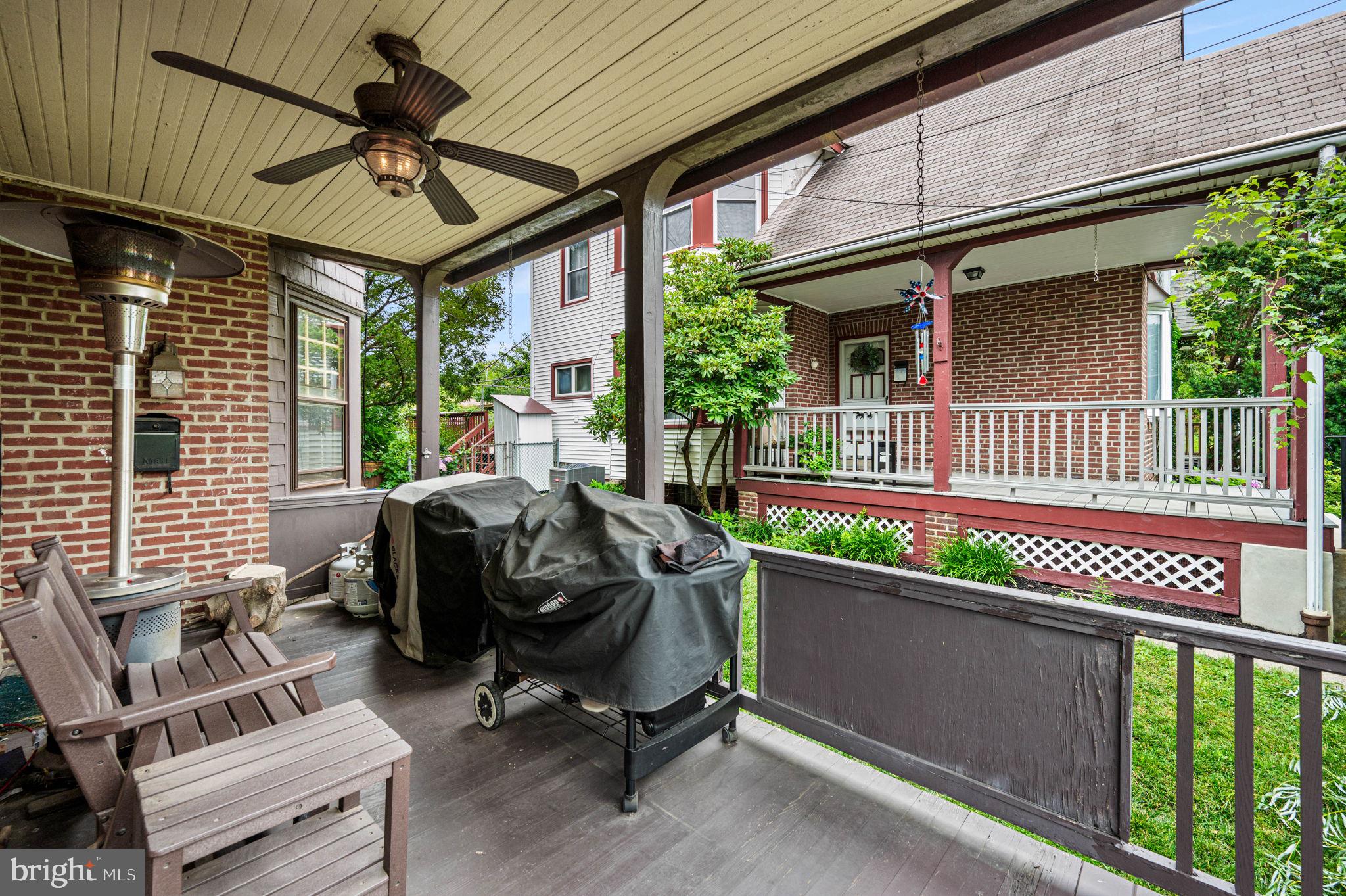 3 Township Line Road Elkins Park, PA 19027 - Photo 5 of 40 Charming porch with lush greenery.