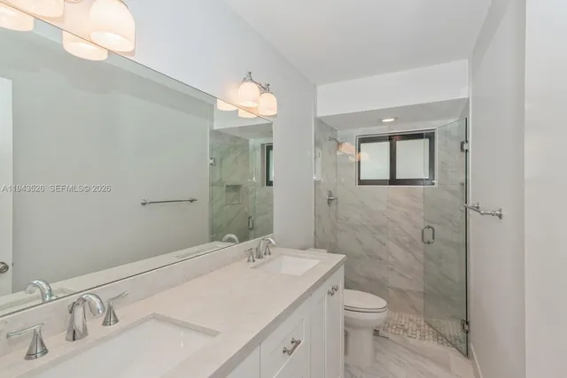 a view of house that has a swimming pool