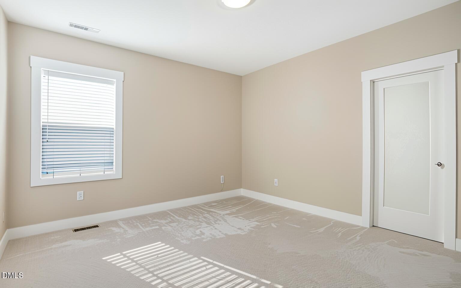 1105 Logperch Way Wendell, NC 27591 - Photo 20 of 29 a view of an empty room with a window