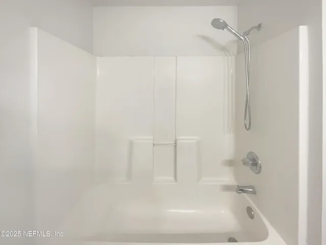 a close up of a bathtub