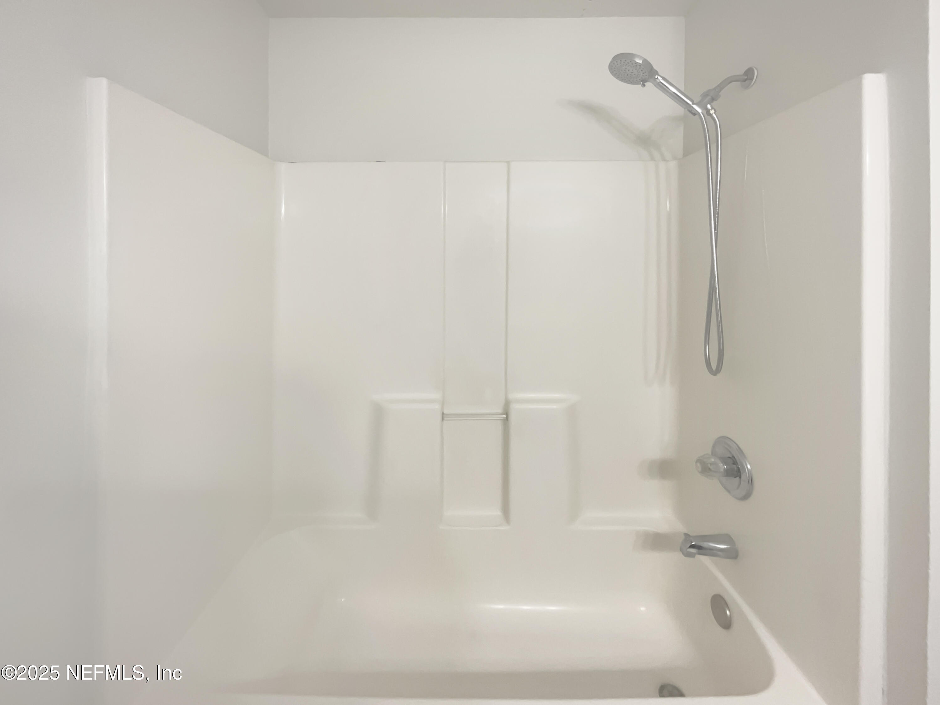 7920 Merrill Road, Unit 1115 Jacksonville, FL 32277 - Photo 17 of 19 a close up of a bathtub