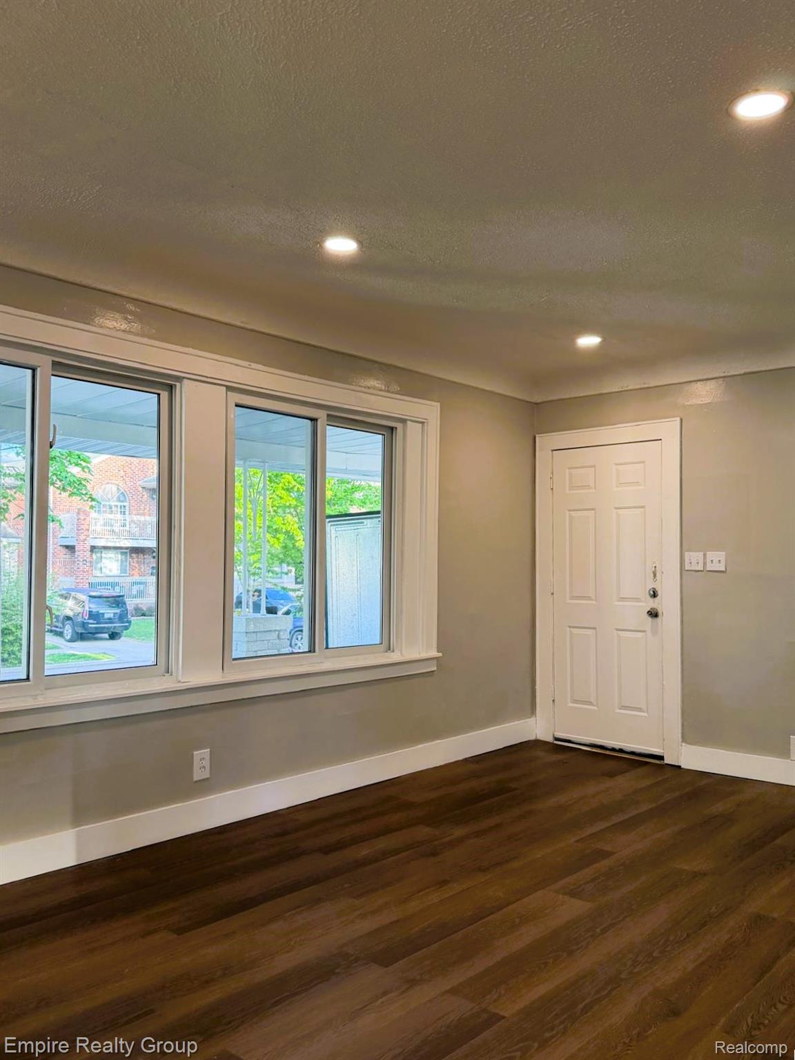 6441 Appoline Street, Unit 1 Dearborn, MI 48126 - Photo 3 of 13 Entryway featuring dark wood-type flooring and recessed lighting