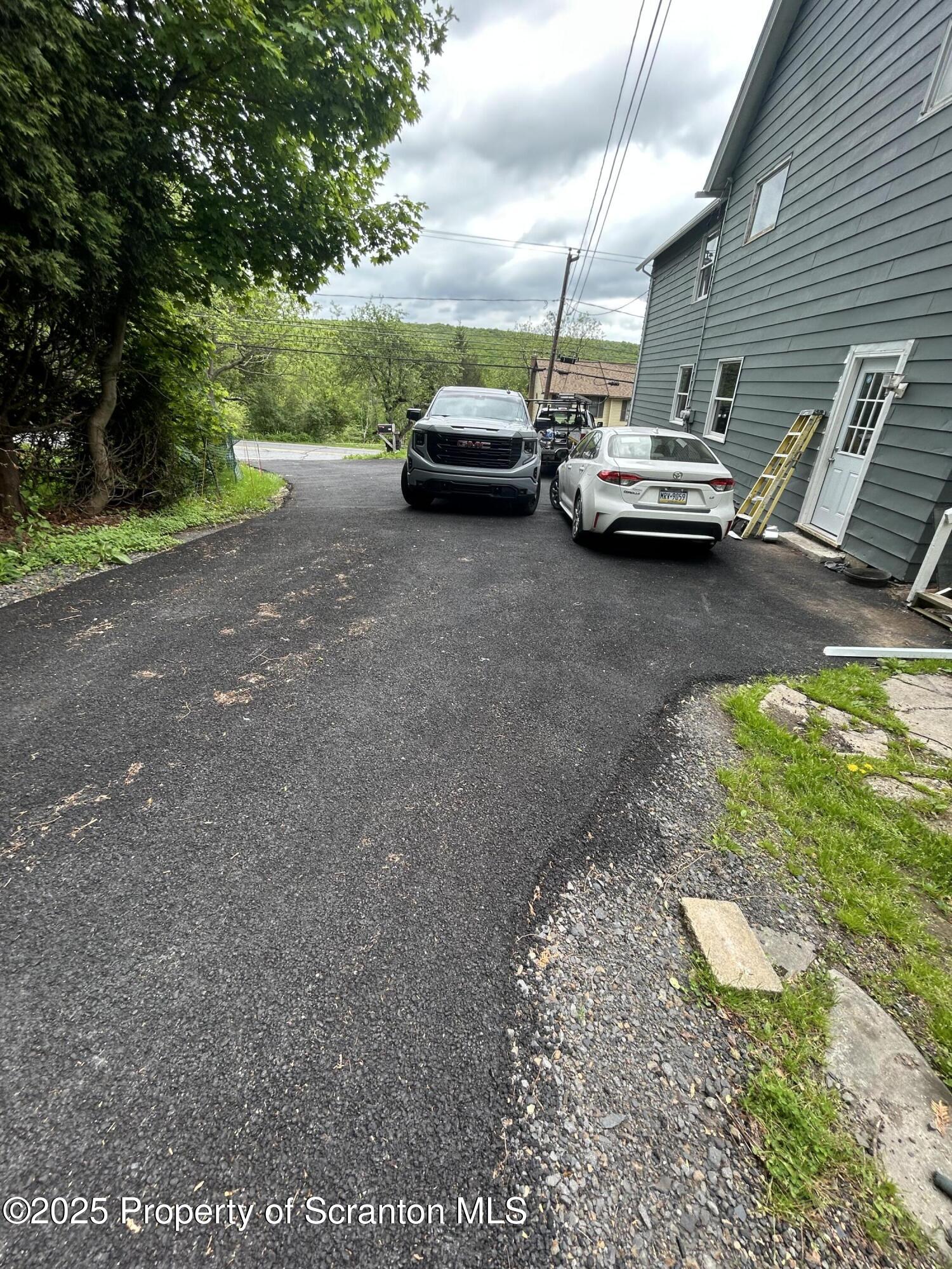 1177 North Main Street Forest City, PA 18421 - Photo 11 of 27 a view of street with parked cars