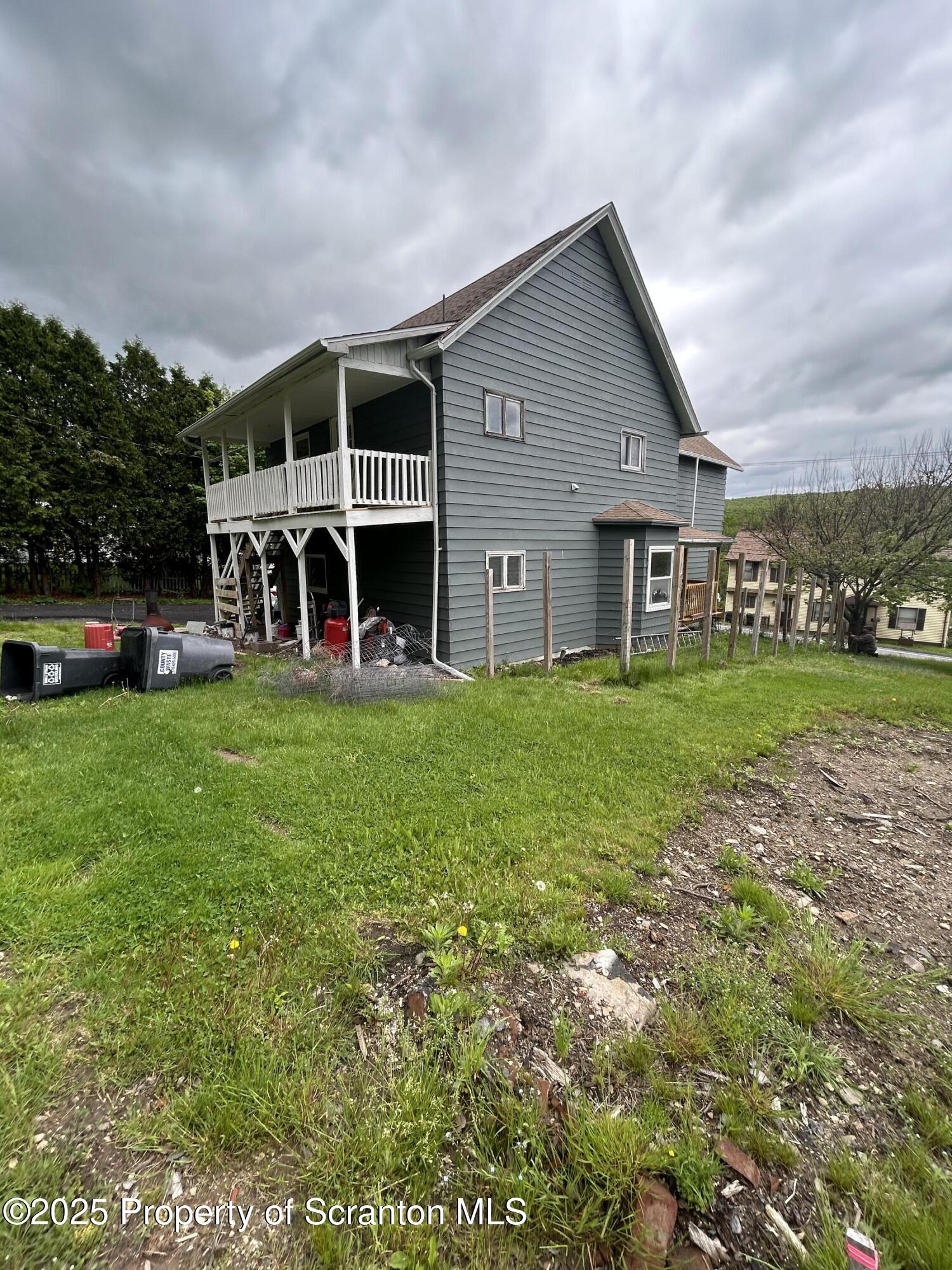 1177 North Main Street Forest City, PA 18421 - Photo 12 of 27 a view of a house with a yard and sitting area